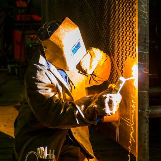 Man Welding Metal